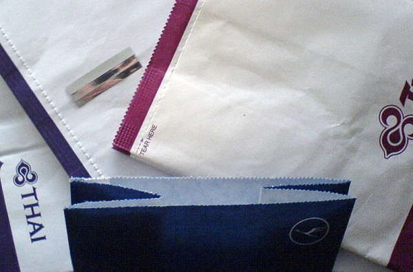  Thai Airways and Lufthansa airsickness bags. 